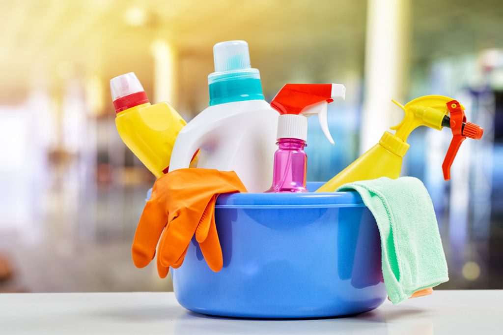 Cleaning supplies in a bucket